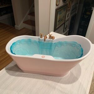 Charming Pink Doll Bathtub with Blue Water Feature